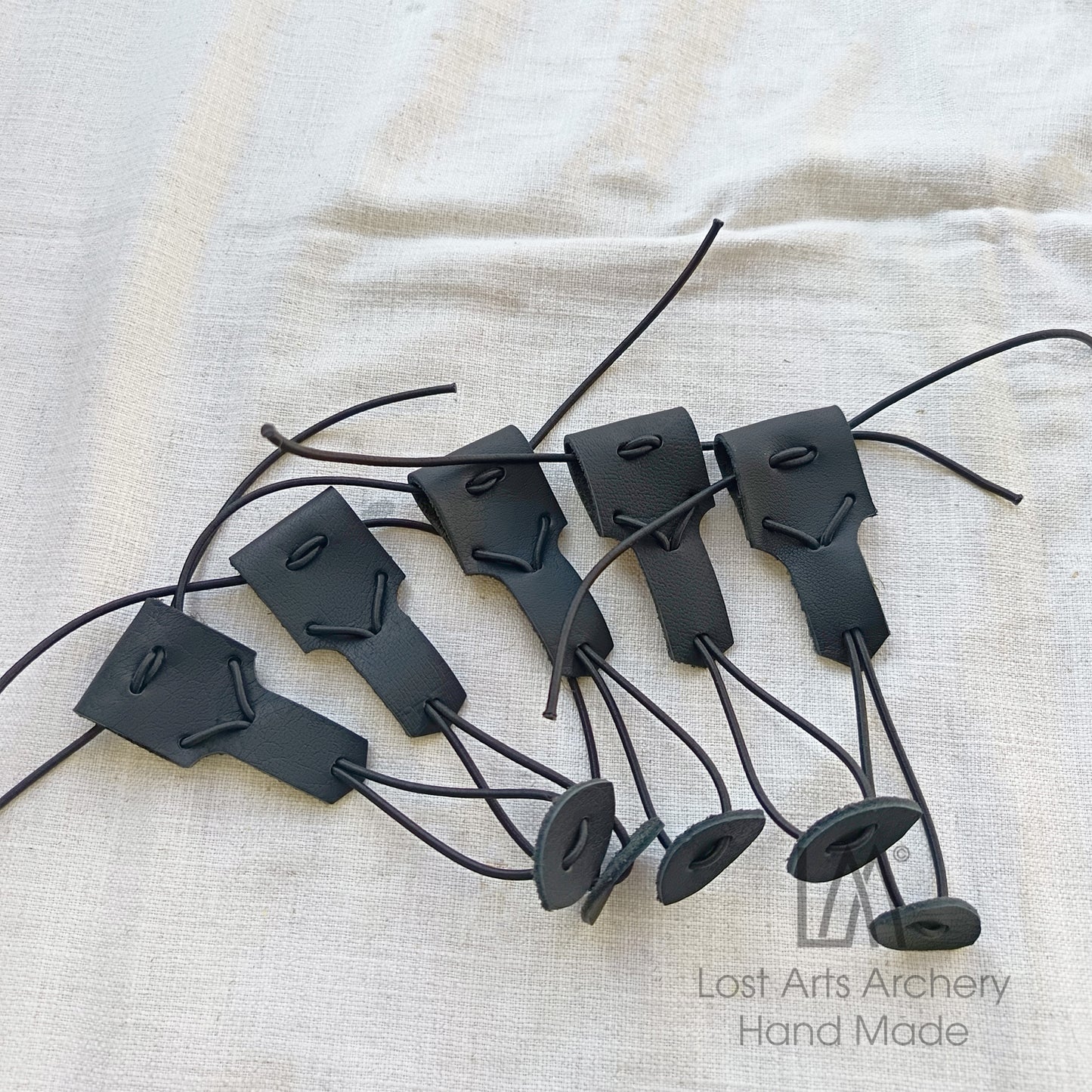 Adjustable String Keepers